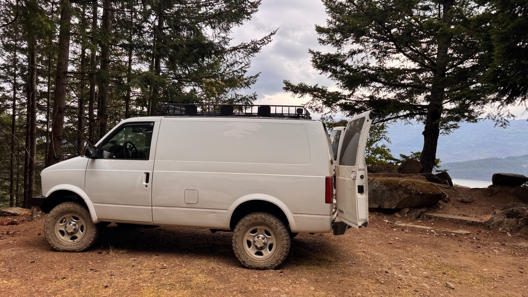 The Astro parked at a Harrison Lake FSR pullout with rear barn door open