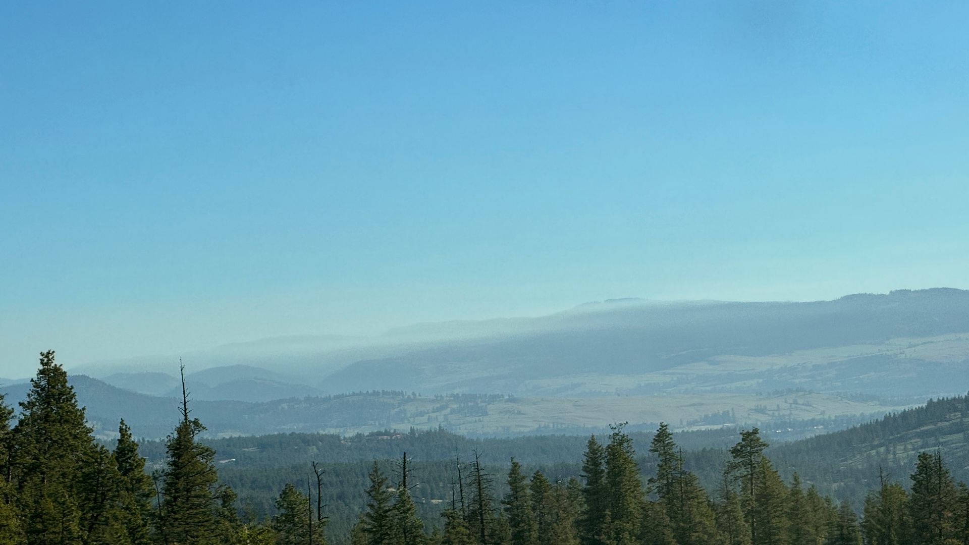Hazy ridges layered into the distance